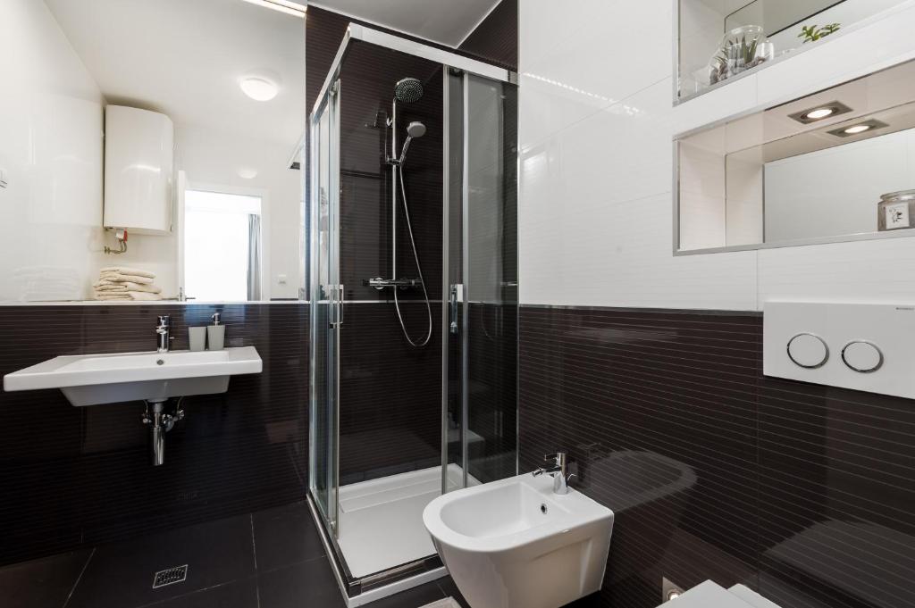 Kúpeľňa v ubytovaní Apartment Stella - heated rooftop swimming pool