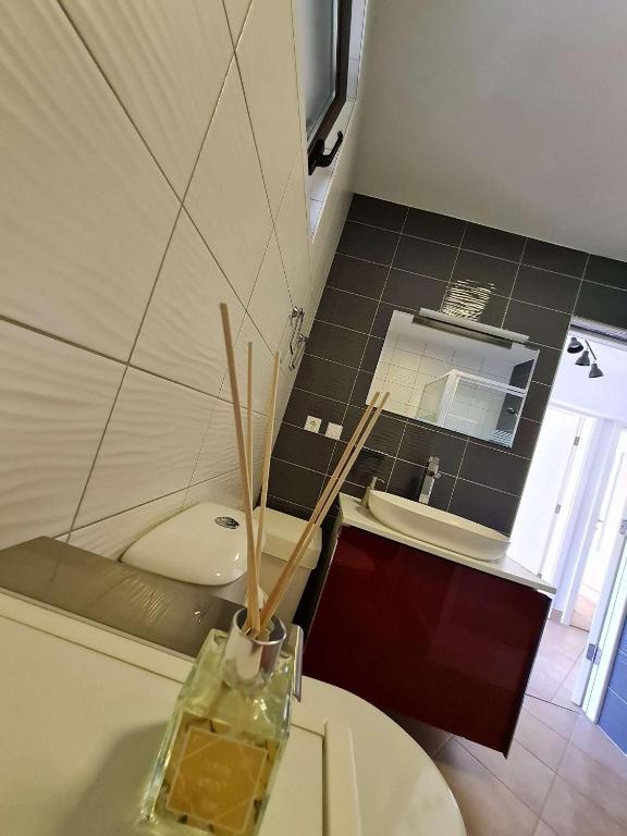 Kúpeľňa v ubytovaní Apartmani Lovre i Zara