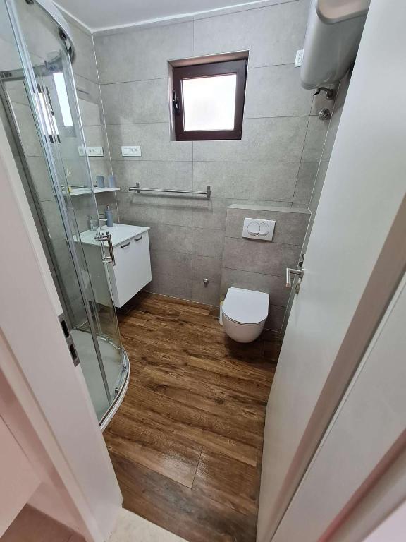 Kúpeľňa v ubytovaní Apartmani Lovre i Zara
