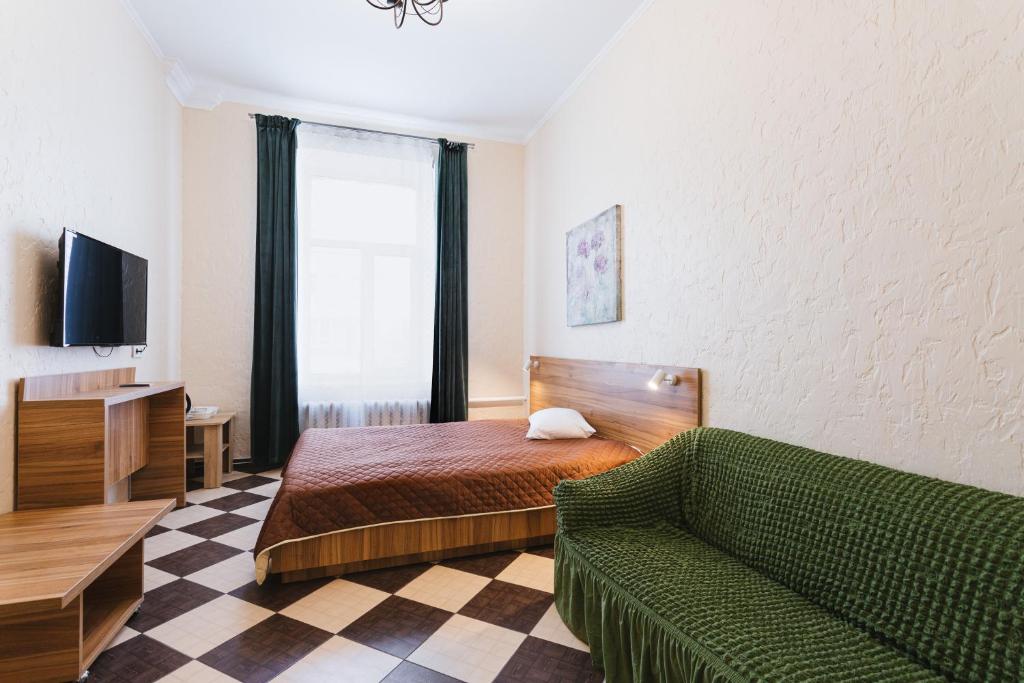 Postel nebo postele na pokoji v ubytování Mini hotel Non-Stop
