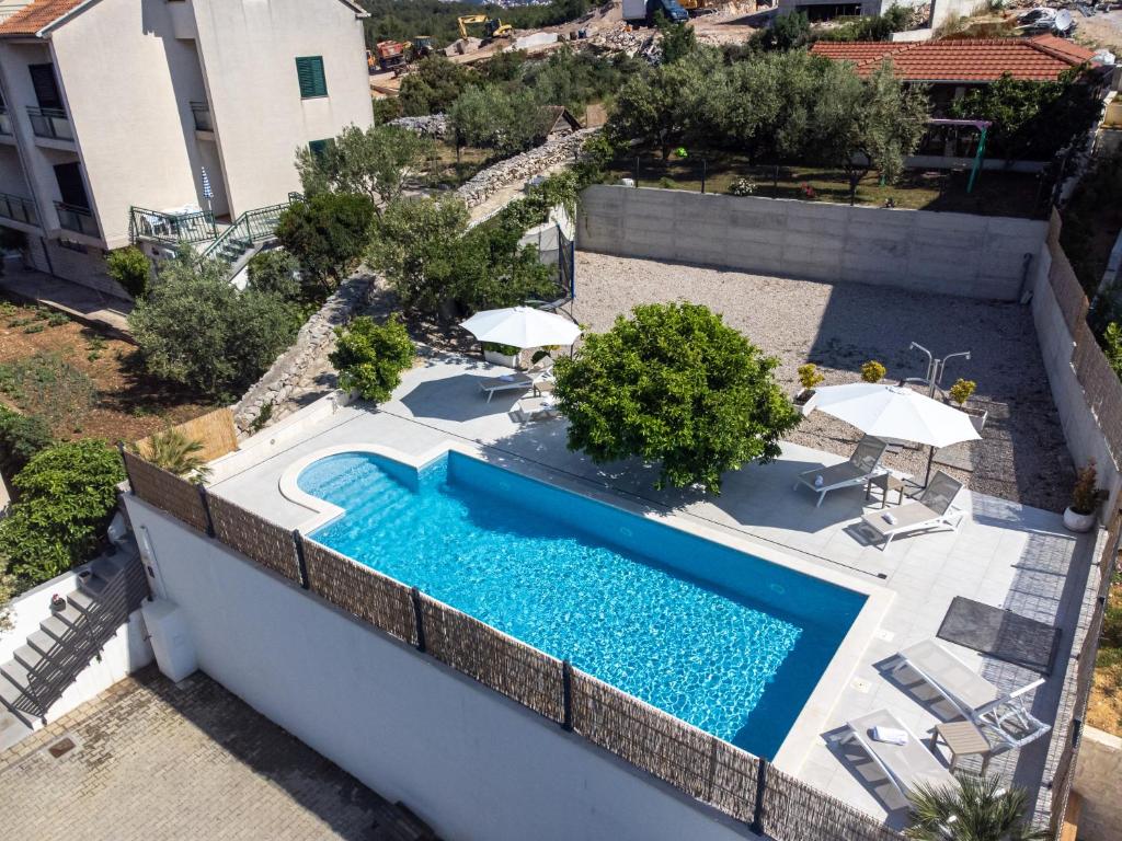 an overhead view of a swimming pool on a building at Sun gardens in Šibenik