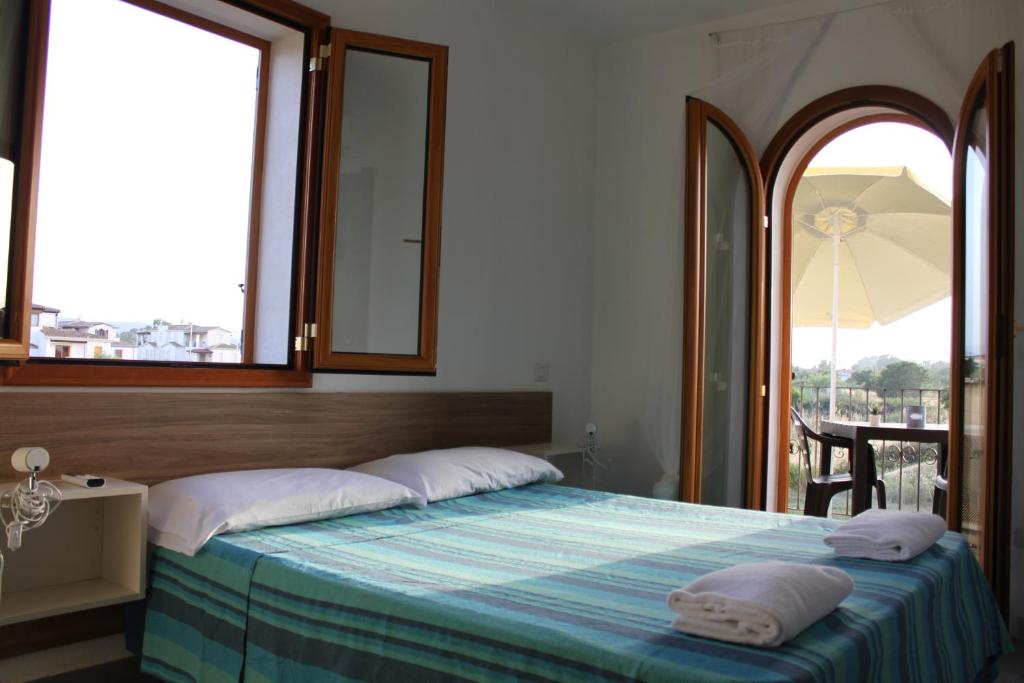 Letto o letti in una camera di Binja Fortuna