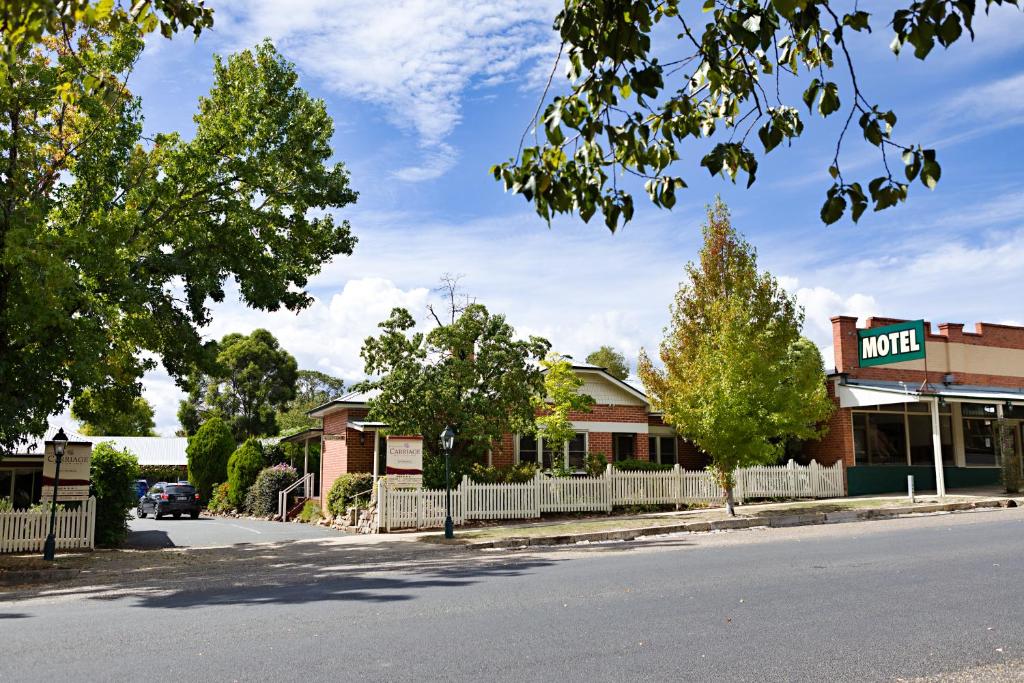 a row of houses on the side of a road at Beechworth Carriage Motor Inn in Beechworth