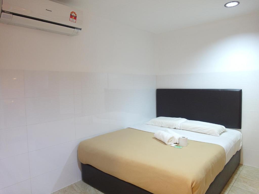 Postel nebo postele na pokoji v ubytování Comfort Two Hotel