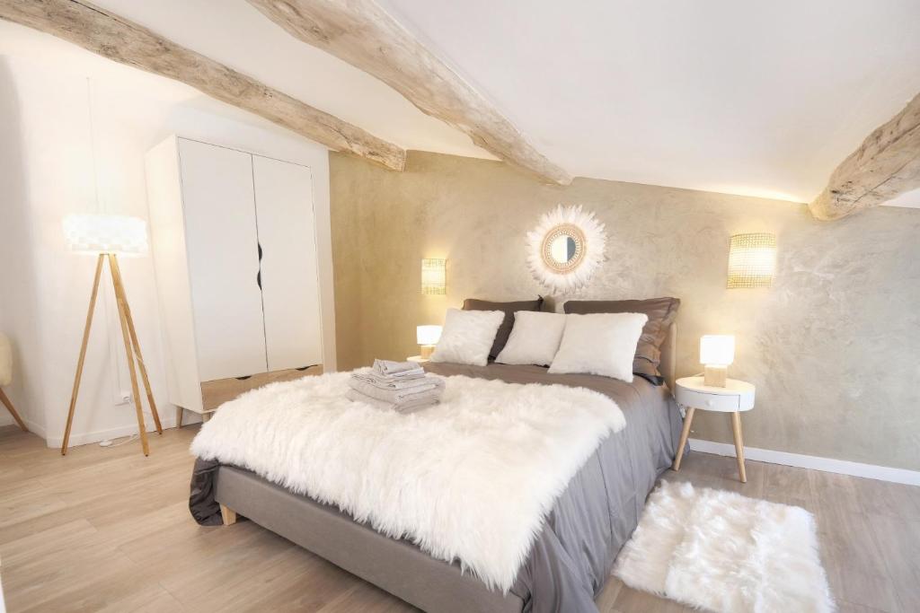 Posteľ alebo postele v izbe v ubytovaní Appartements Premium en Hyper Centre Ville
