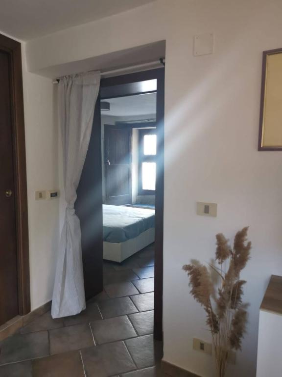 Postel nebo postele na pokoji v ubytování CASA GAIA
