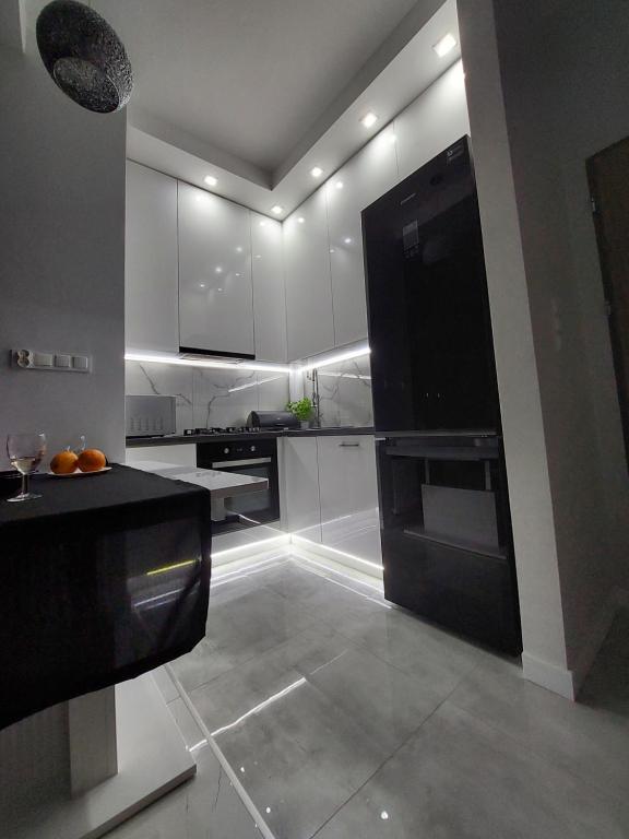 Kuchyň nebo kuchyňský kout v ubytování MP Apartament Białystok Jacuzzi