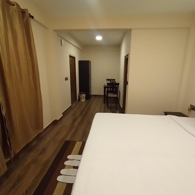 Postel nebo postele na pokoji v ubytování Joyous Rooms