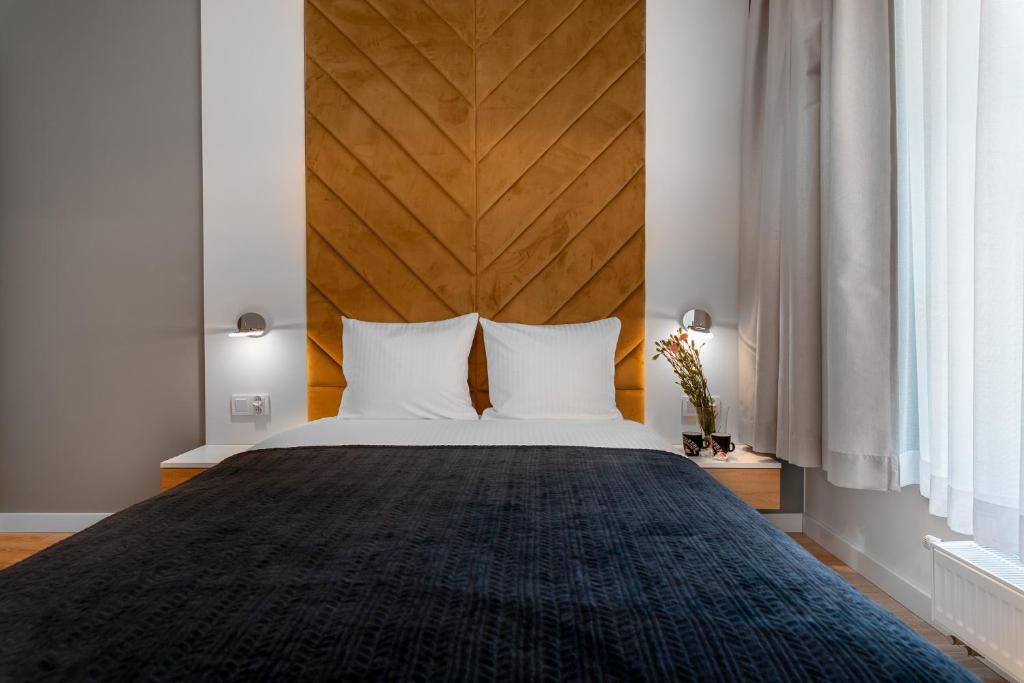 Postel nebo postele na pokoji v ubytování Pure Rental Apartments