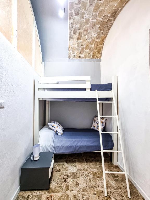 Postel nebo postele na pokoji v ubytování La casa di Michele