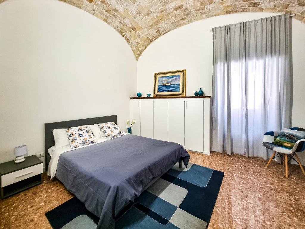 Кровать или кровати в номере La casa di Michele