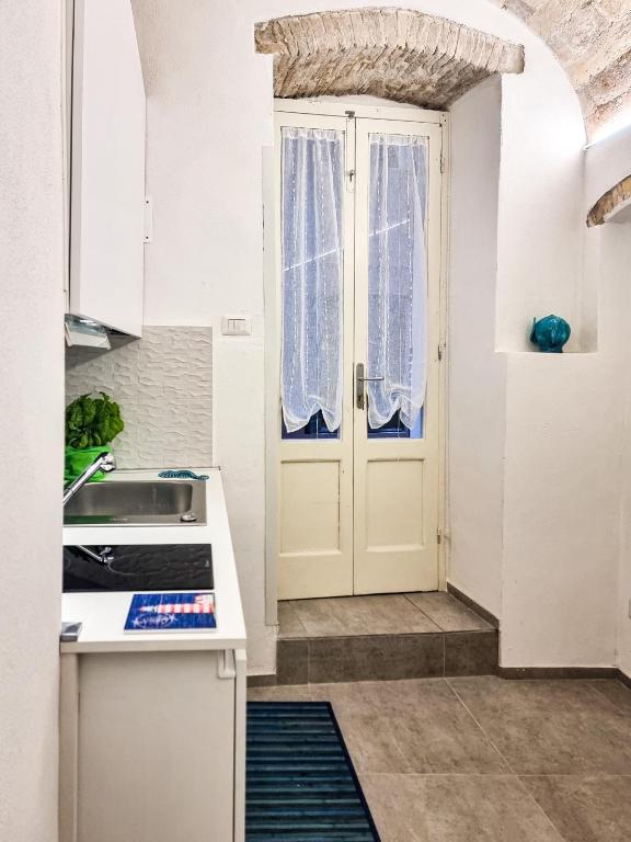 Kuchyň nebo kuchyňský kout v ubytování La casa di Michele