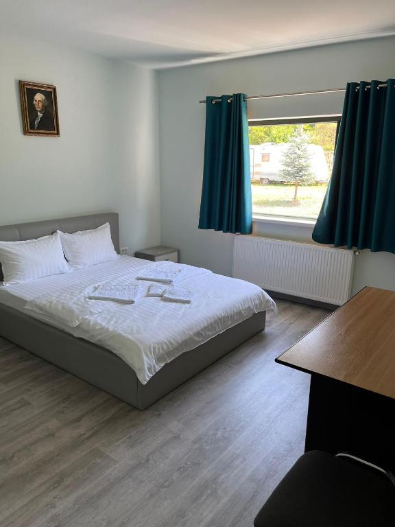 Postel nebo postele na pokoji v ubytování VILA SARA
