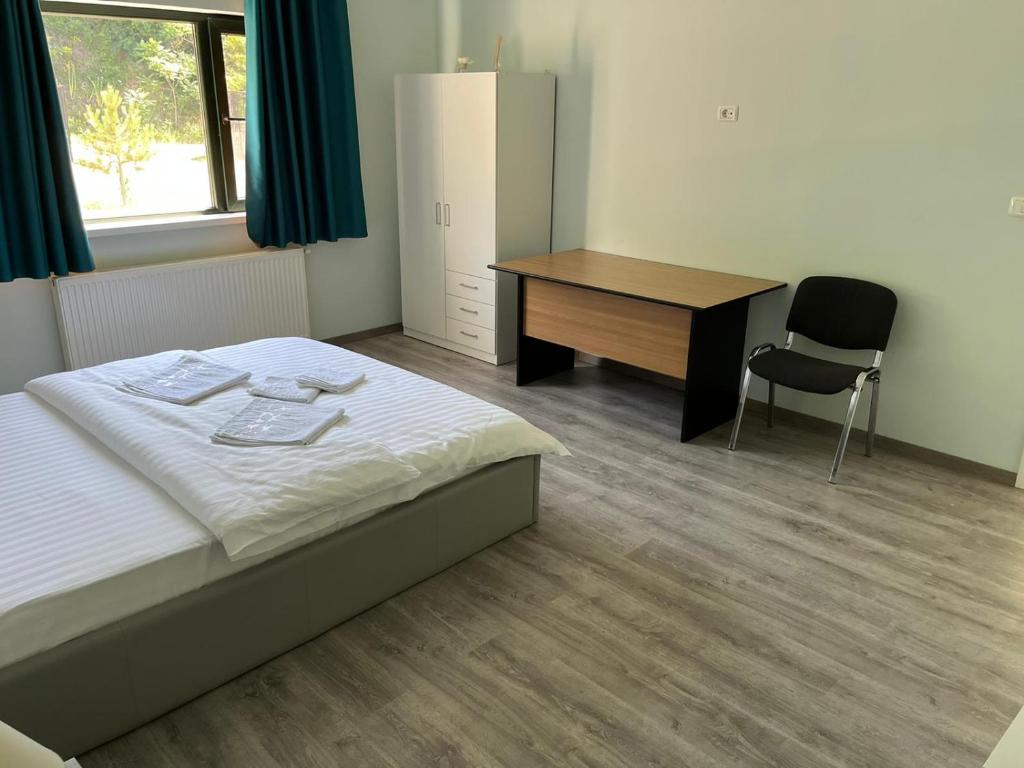 Postel nebo postele na pokoji v ubytování VILA SARA