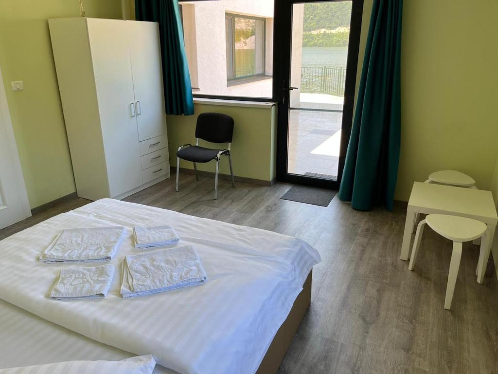 Postel nebo postele na pokoji v ubytování VILA SARA