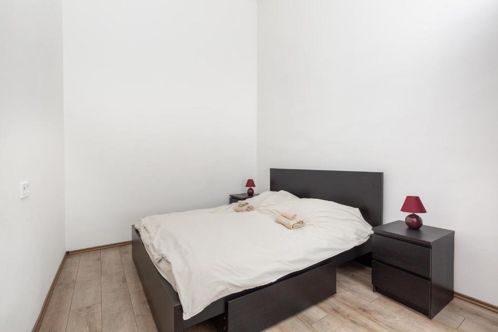 Posteľ alebo postele v izbe v ubytovaní D78 Dohány Apartment