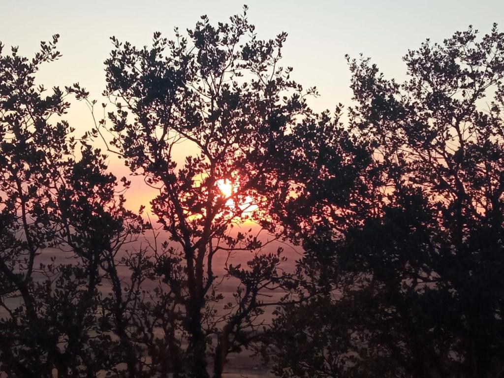 The sunrise or sunset as seen from the holiday home or nearby