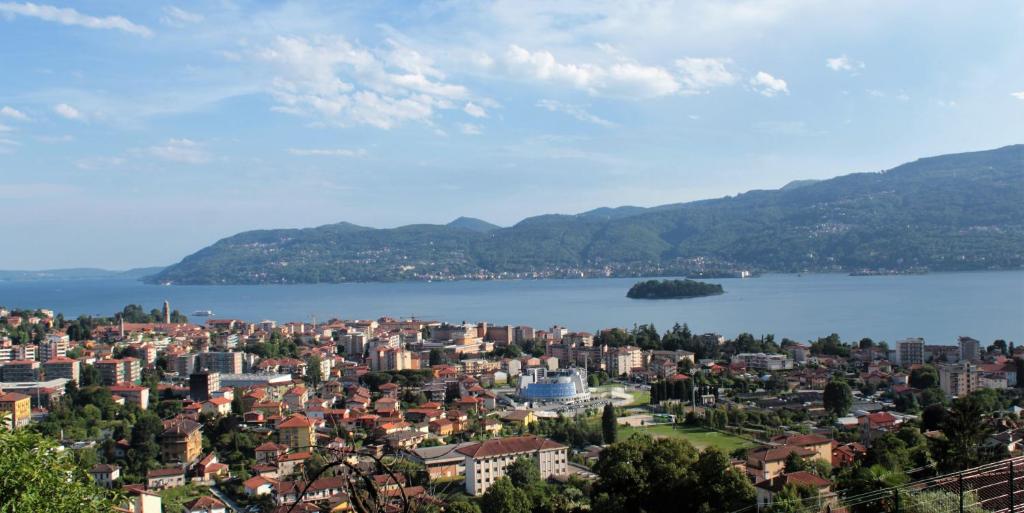 a view of a city and a body of water at Sole in Verbania
