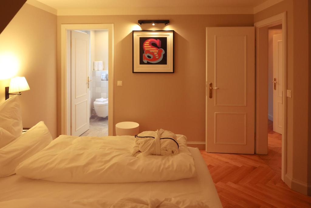 Postel nebo postele na pokoji v ubytování Mimosa House