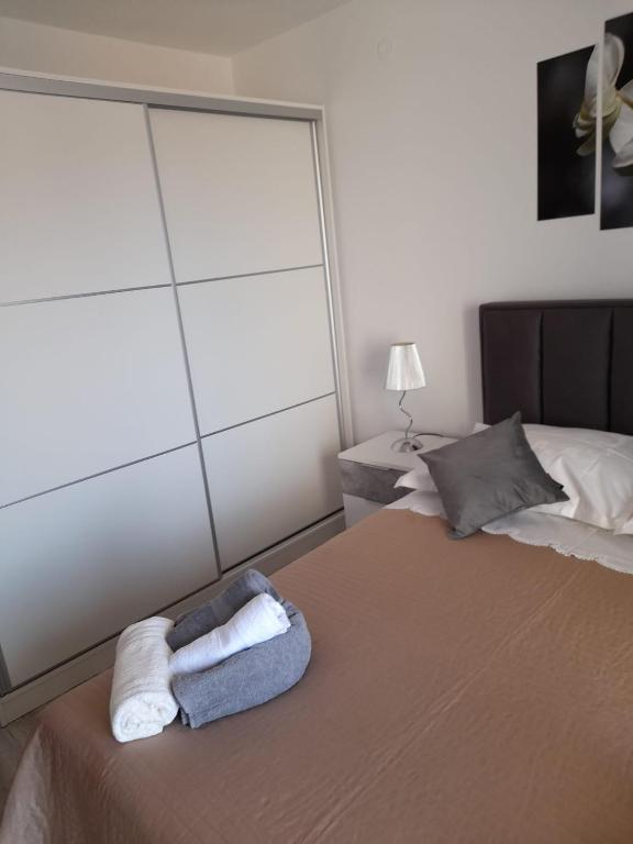 Posteľ alebo postele v izbe v ubytovaní Apartman Lucy