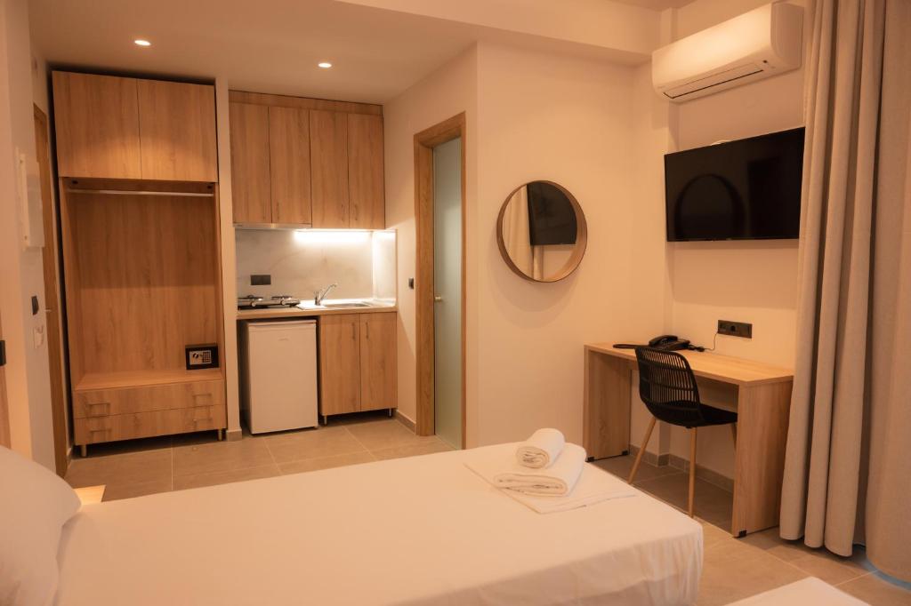 Kuchyň nebo kuchyňský kout v ubytování Nomad Hotel Paralia