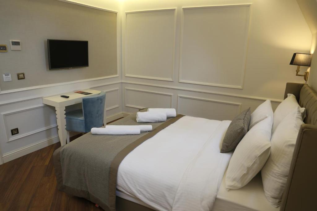 TV a/nebo společenská místnost v ubytování Mina Hotel - Special Category