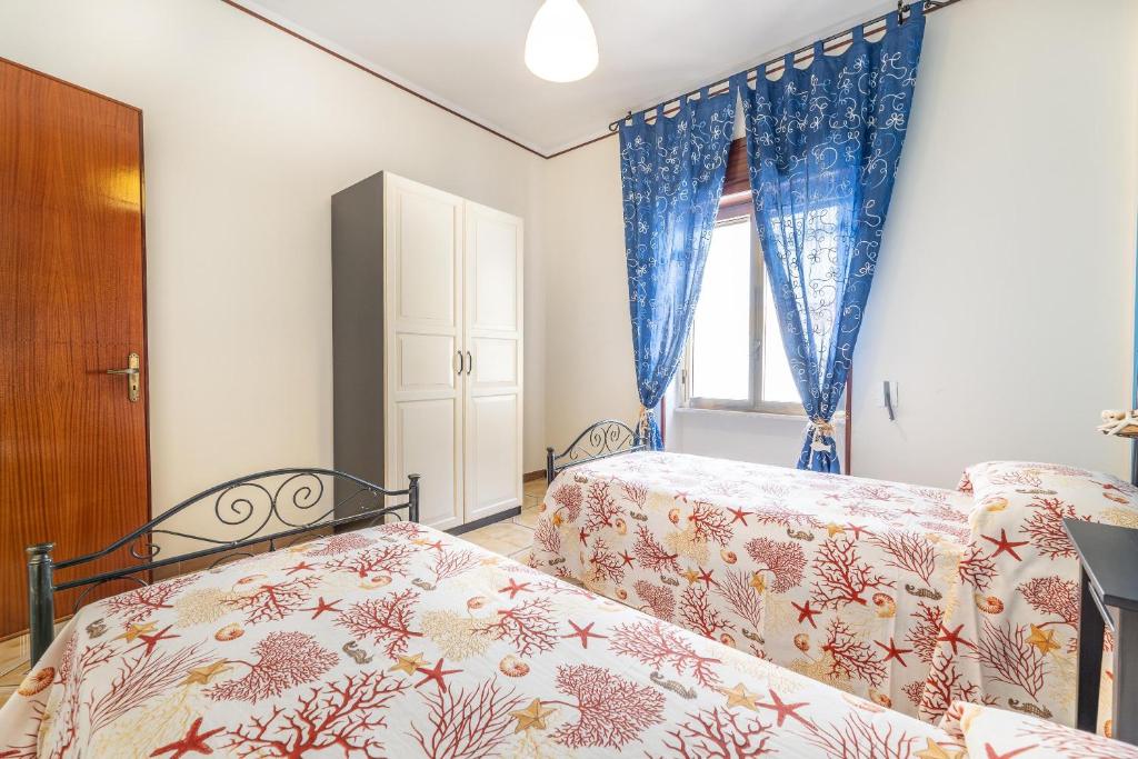 Postel nebo postele na pokoji v ubytování Villetta Family