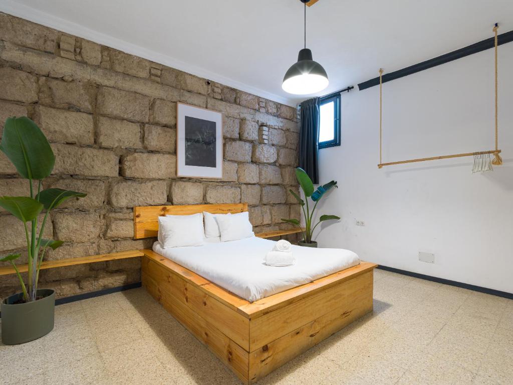 Postel nebo postele na pokoji v ubytování Cathedral Apartment