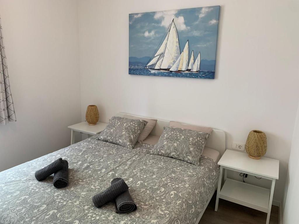 Postel nebo postele na pokoji v ubytování Hygge Apartments
