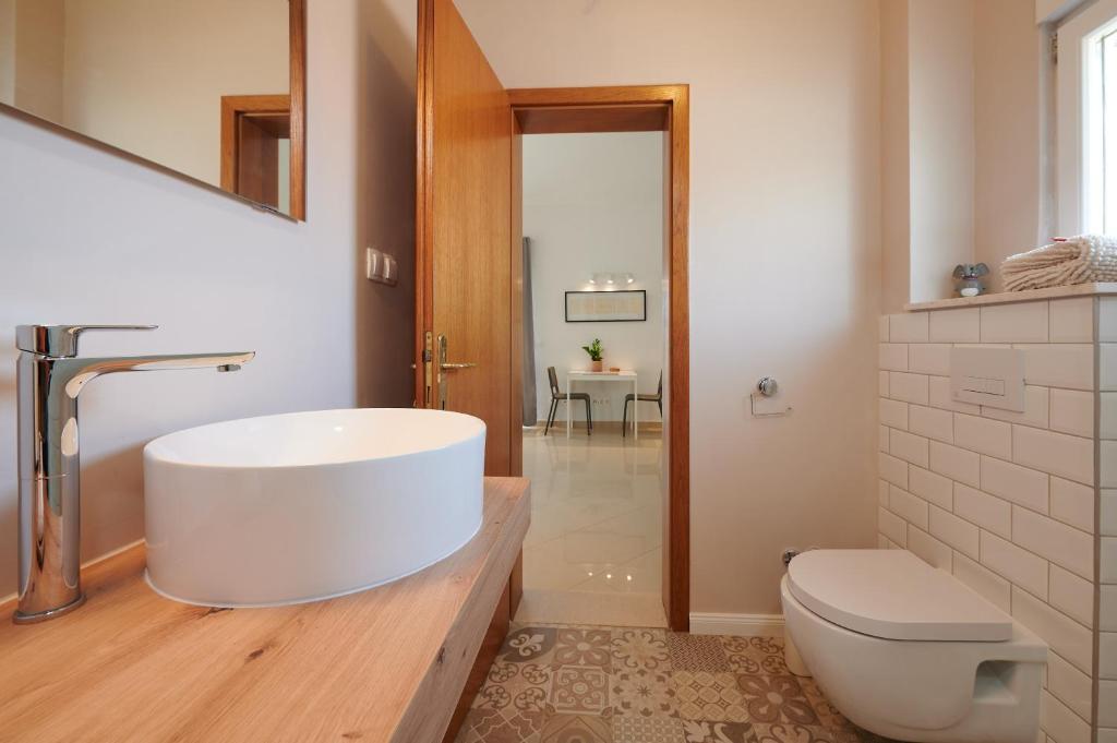 Koupelna v ubytování T&T Sea View Apartments