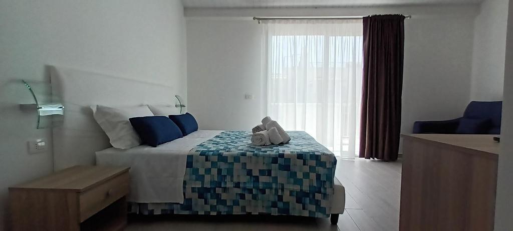 Postel nebo postele na pokoji v ubytování B&B Casa a Liu