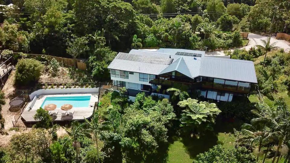 an aerial view of a house with a swimming pool at Coral villa in Byron Bay