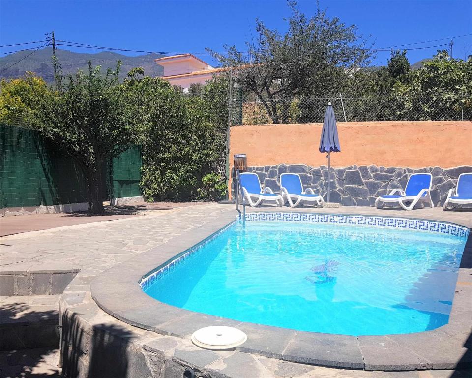 Bazén v ubytování Finca La Casita en entorno natural nebo v jeho okolí