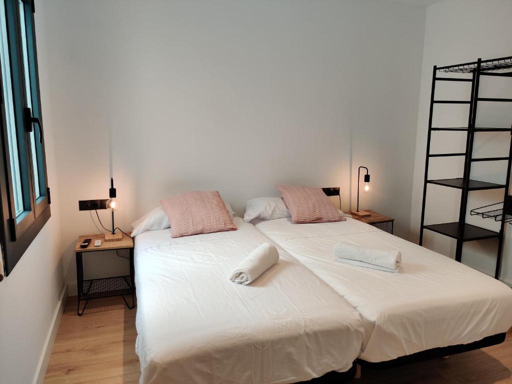 Postel nebo postele na pokoji v ubytování Stylish apartments Camp Nou