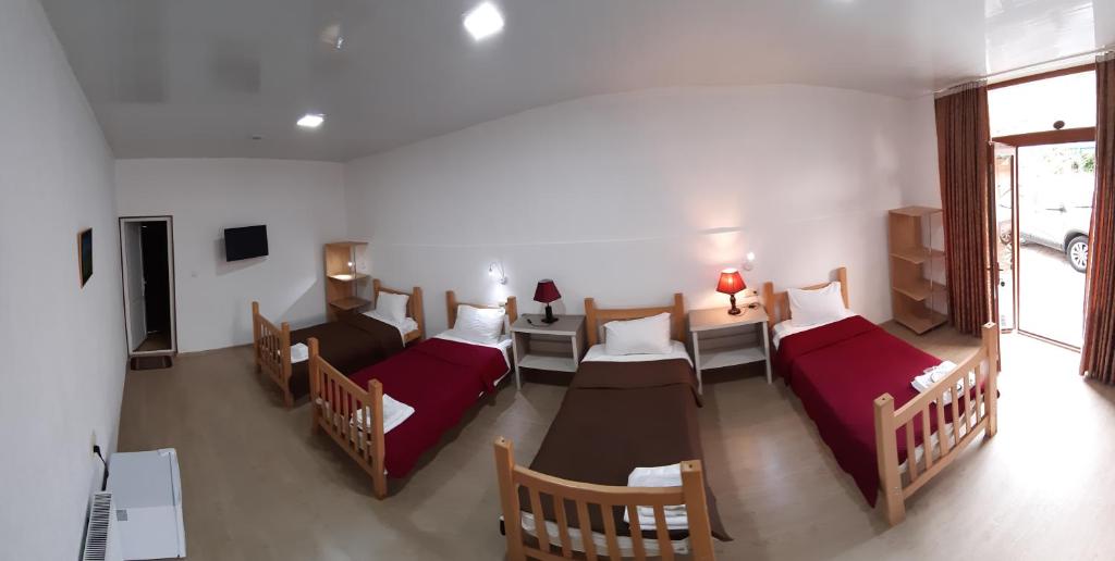Postel nebo postele na pokoji v ubytování Hotel Dimasi