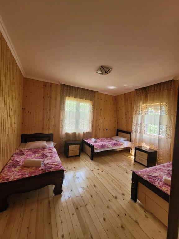 Postel nebo postele na pokoji v ubytování Guesthouse Miranda