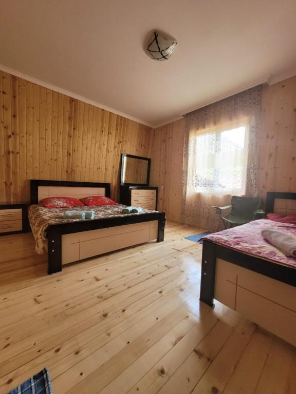 Postel nebo postele na pokoji v ubytování Guesthouse Miranda