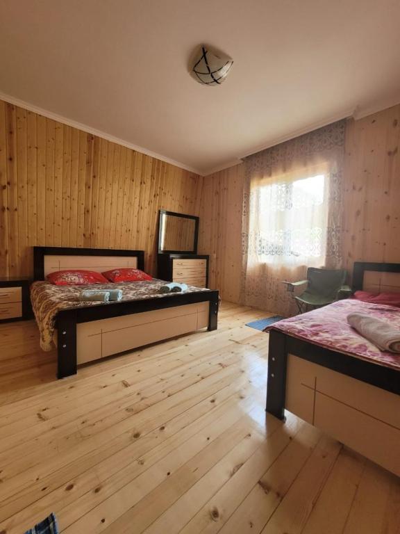 Postel nebo postele na pokoji v ubytování Guesthouse Miranda