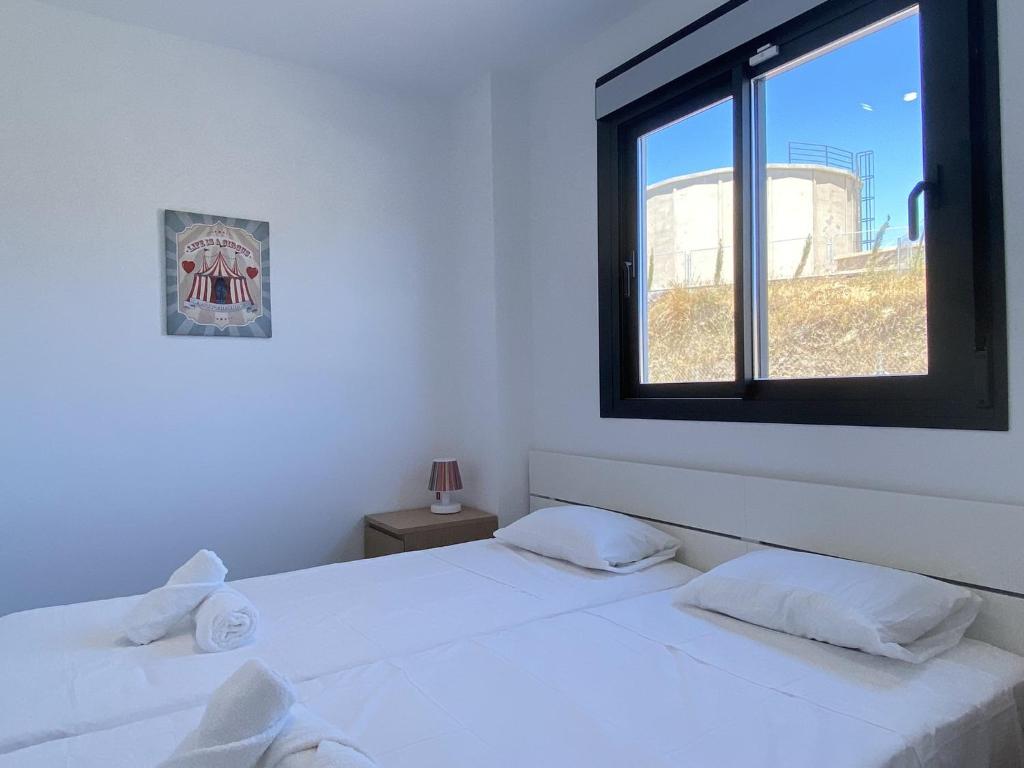 Postel nebo postele na pokoji v ubytování Penthouse Balcon del Mar Deluxe 3 Casasol