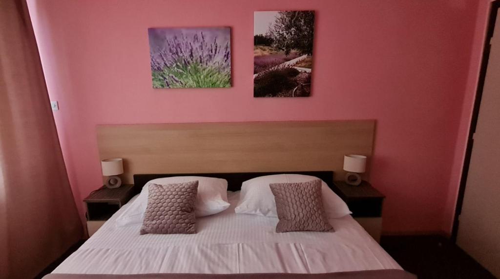 Posteľ alebo postele v izbe v ubytovaní Apartman Norma free parking