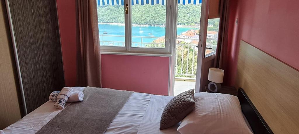 Posteľ alebo postele v izbe v ubytovaní Apartman Norma free parking