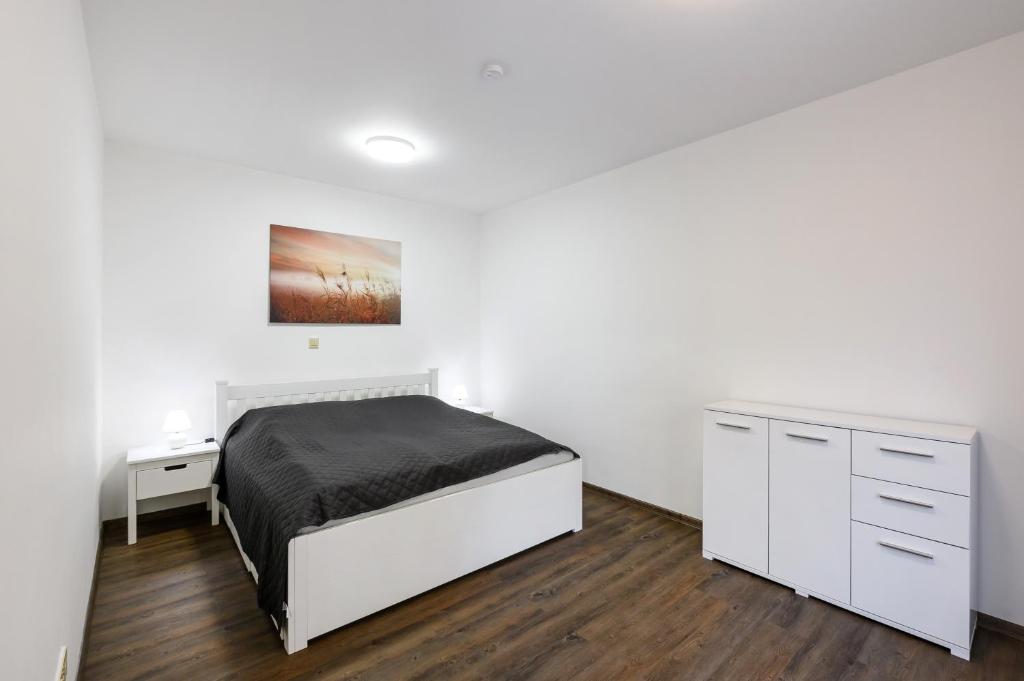 Posteľ alebo postele v izbe v ubytovaní Apartmány Závětří