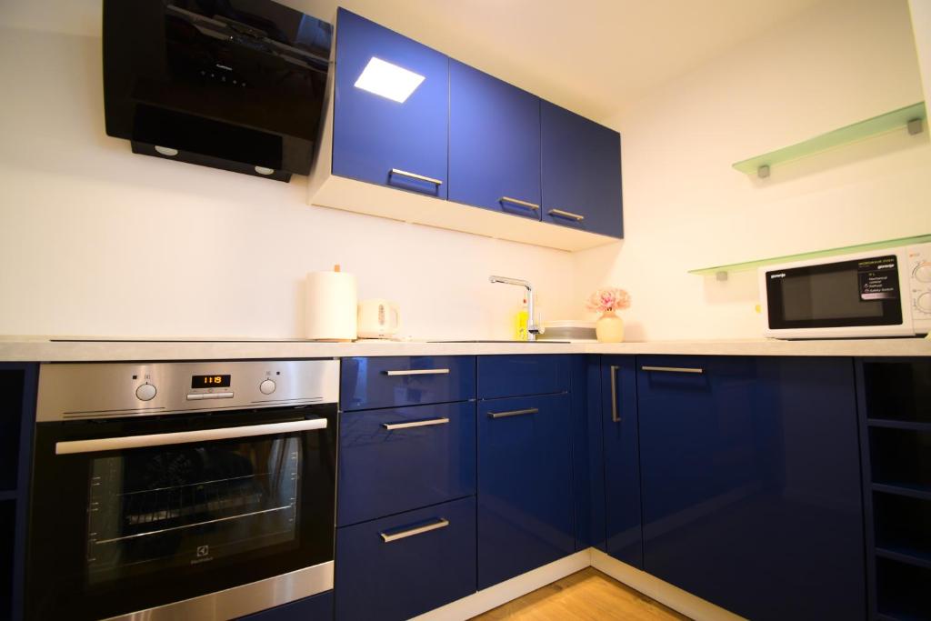 Kuchyňa alebo kuchynka v ubytovaní Apartman Veronique