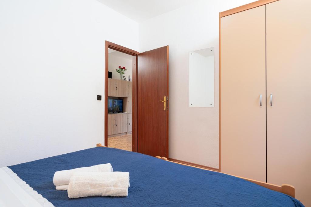 Postel nebo postele na pokoji v ubytování Holiday Home Sansevic