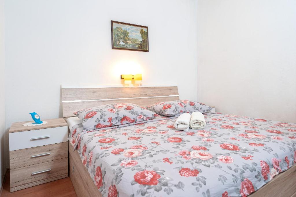 Postel nebo postele na pokoji v ubytování Holiday Home Sansevic