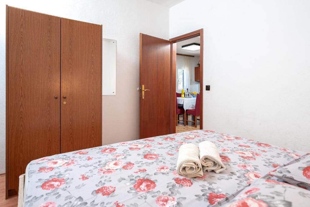 Postel nebo postele na pokoji v ubytování Holiday Home Sansevic
