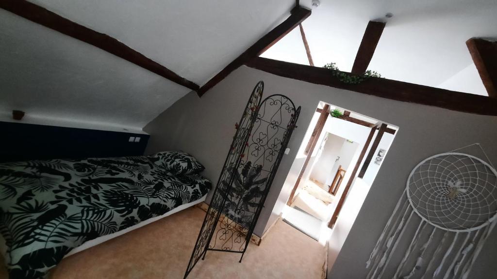 Posteľ alebo postele v izbe v ubytovaní Le Torcy Lodge