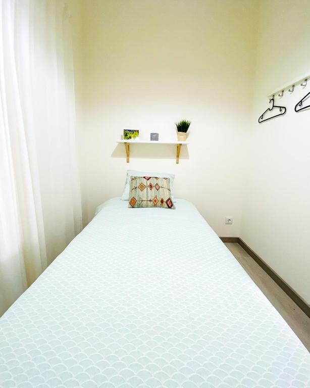 Postel nebo postele na pokoji v ubytování Marzia Boutique Home