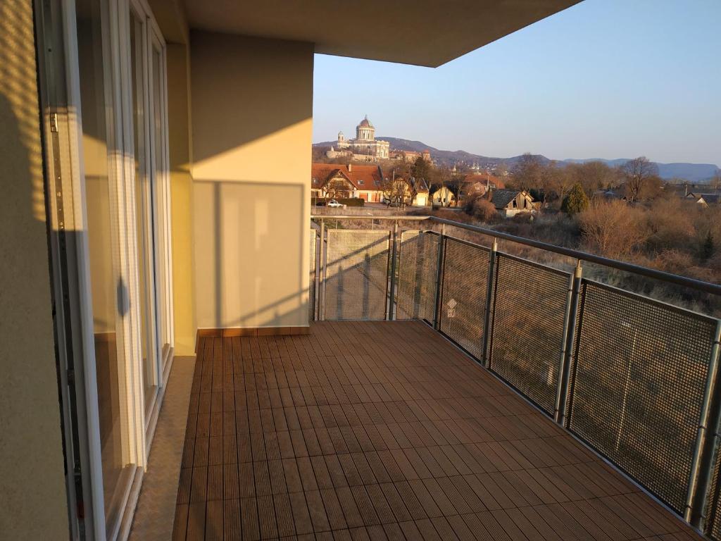 a balcony with a view of a building at Apartmán One To One in Štúrovo