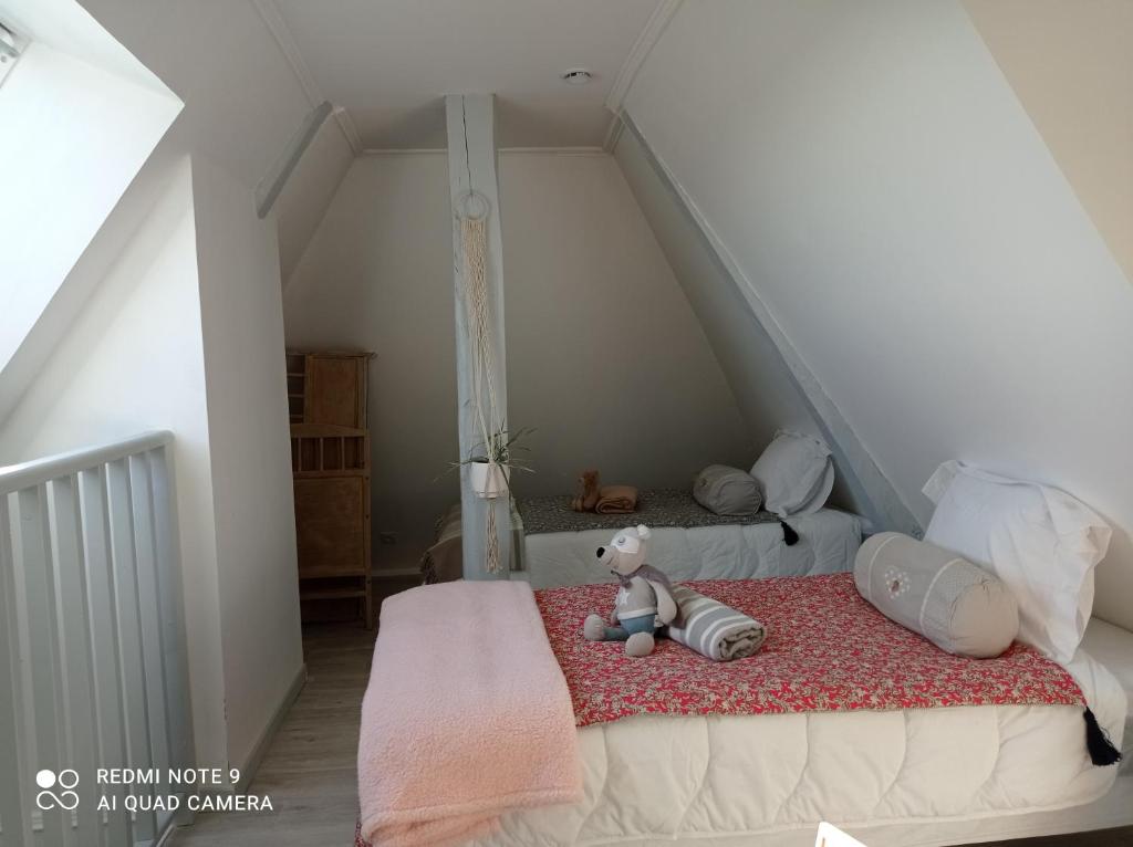 Łóżko lub łóżka w pokoju w obiekcie Gîte du roy